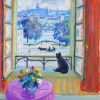 Le chat nouir à la fenêtre