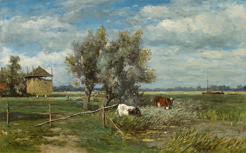Koeien bij de hooiberg