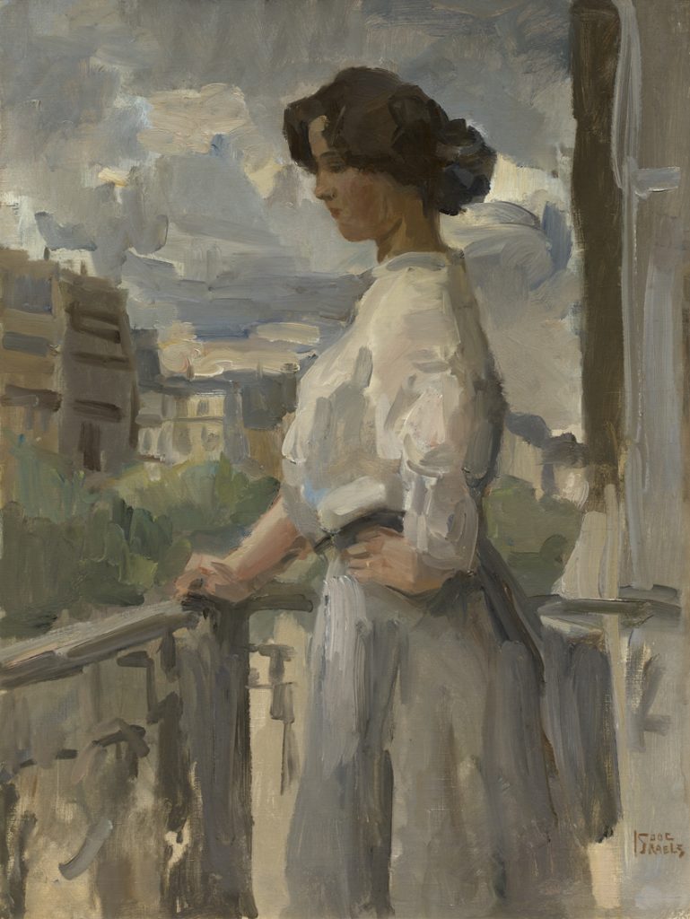 Vrouw op een balkon in Parijs