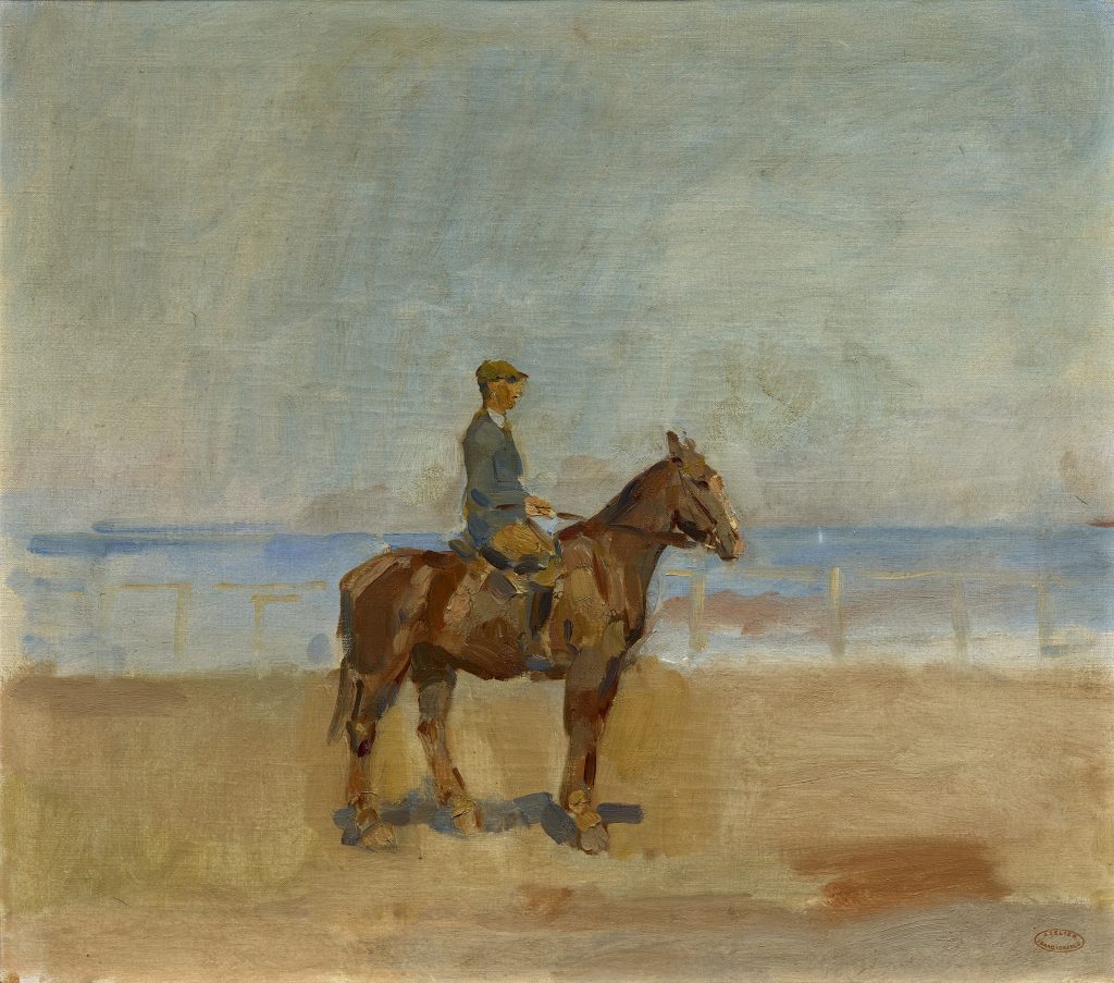 Ruiter op het strand van Scheveningen